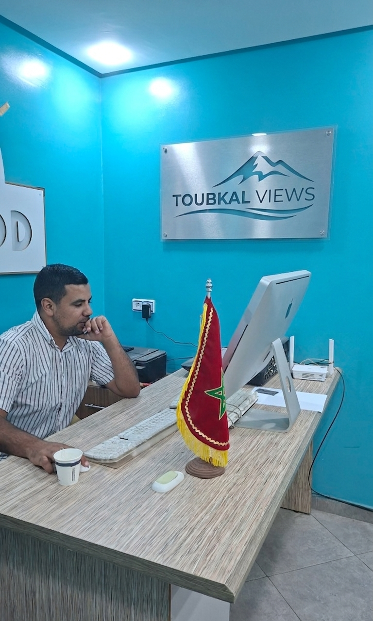 The Toubkal Views office in Marrakech with the company sign