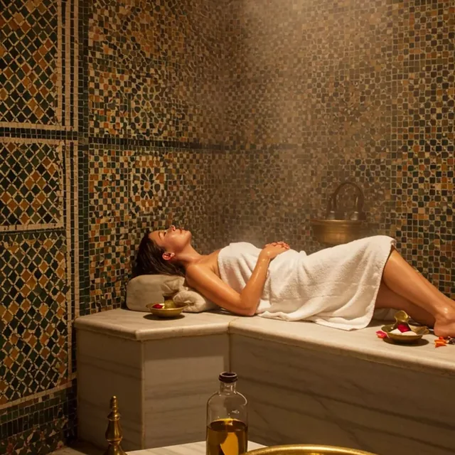 Mosaic-tiled steam room of a traditional Moroccan hammam