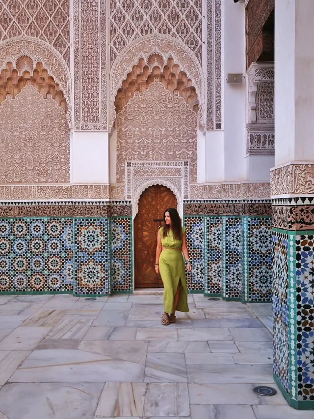 The carved stucco and zellige courtyard of the Medersa Ben Youssef