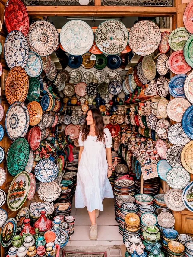 A narrow Marrakech pottery shop hung floor to ceiling with hand-painted plates and bowls